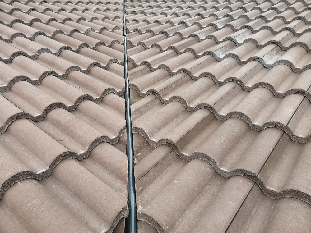 A close up of a concrete tile roof