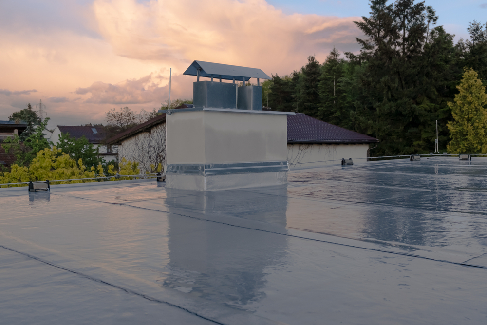 A flat roof covered with PVC membrane roofing material